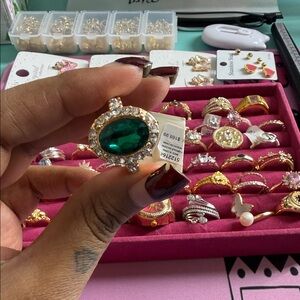 Gold-Tone Ring with Emerald Green Center Stone and Clear Accents